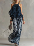 Completo con top con scollo all’americana e pantaloni a gamba larga con stampa Sofia