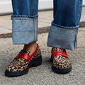 Instappers met luipaardprint en rood detail