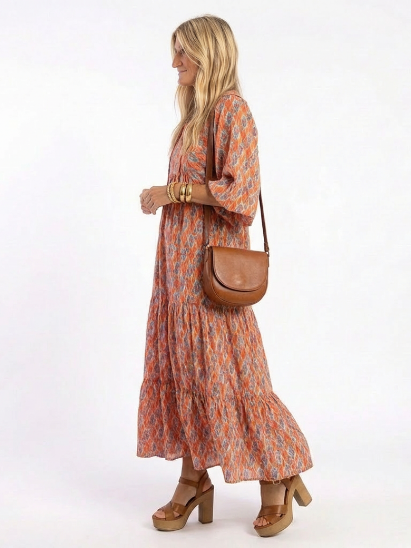Amara | Vestido midi em camadas com estampa geométrica e decote em V