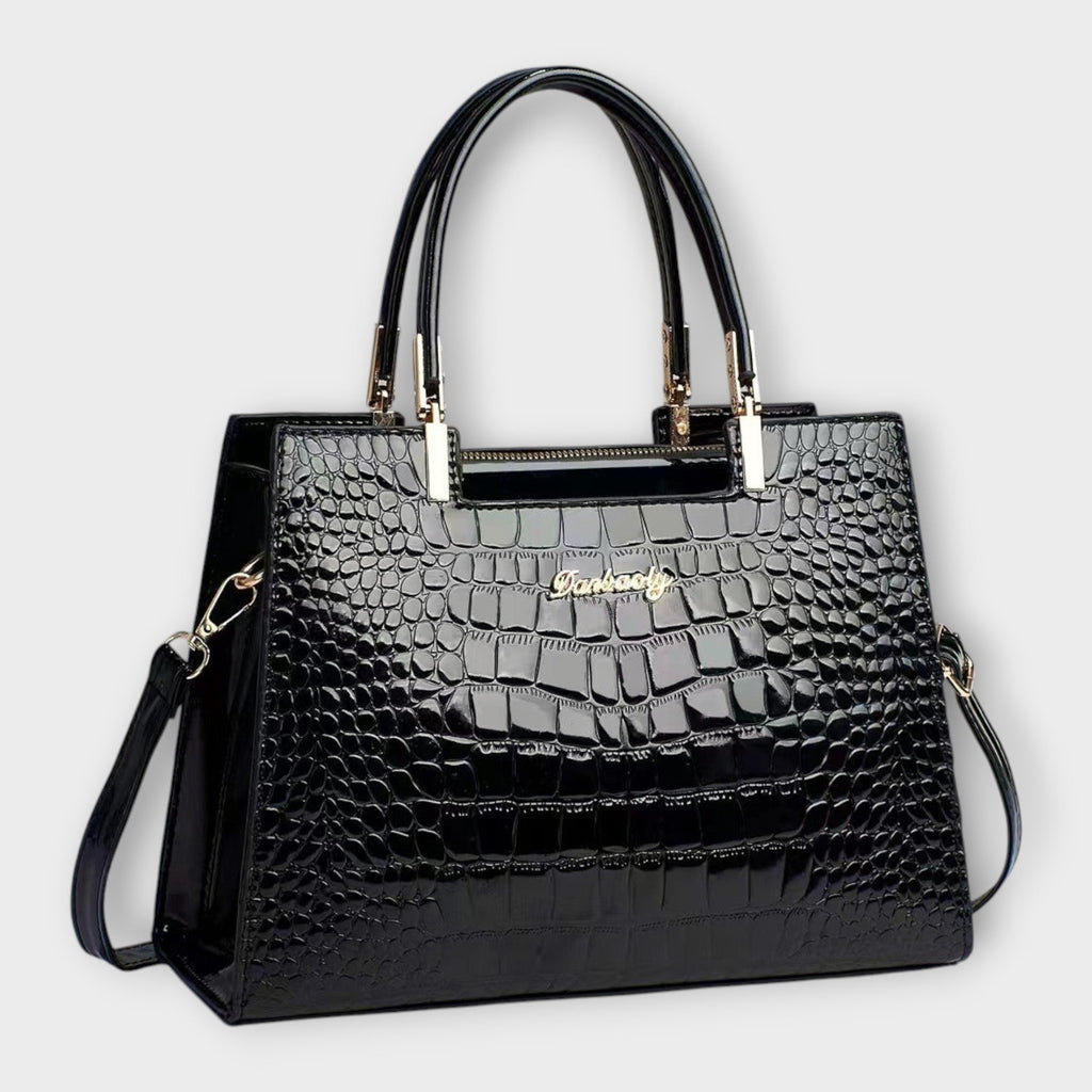 Olivia - Borsa a mano lucida con motivo coccodrillo