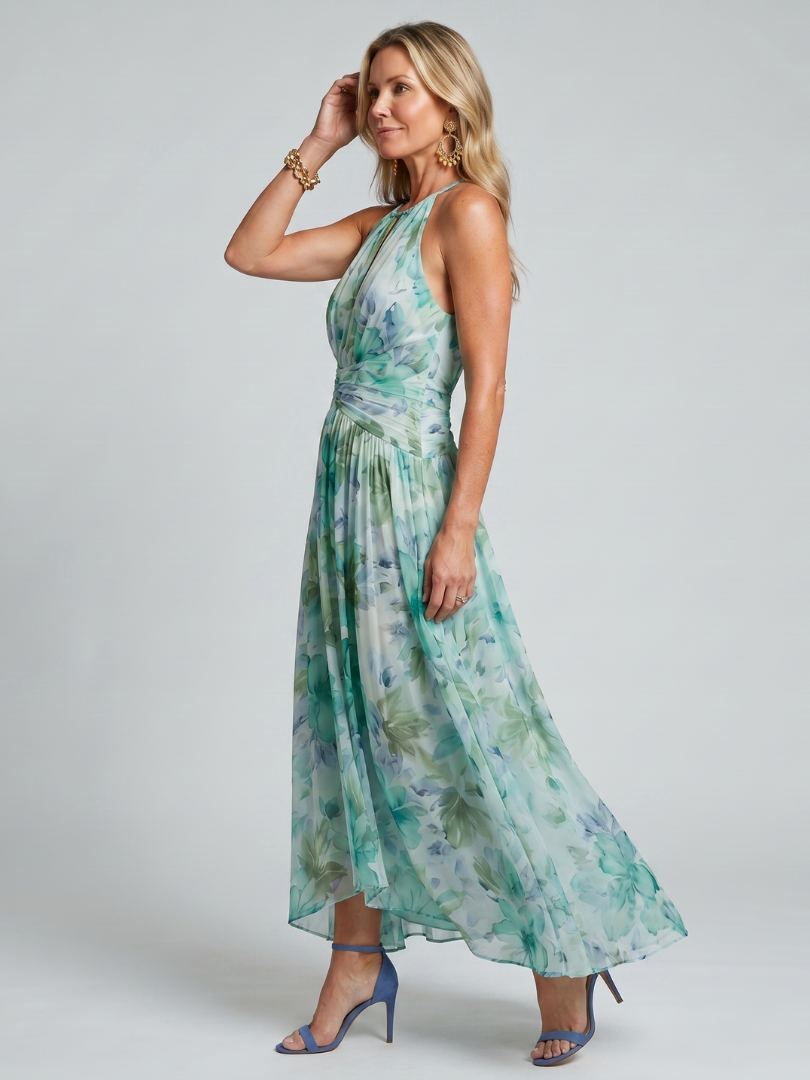 Portia | Geplooide halter-midirk met zacht bloemenpatroon