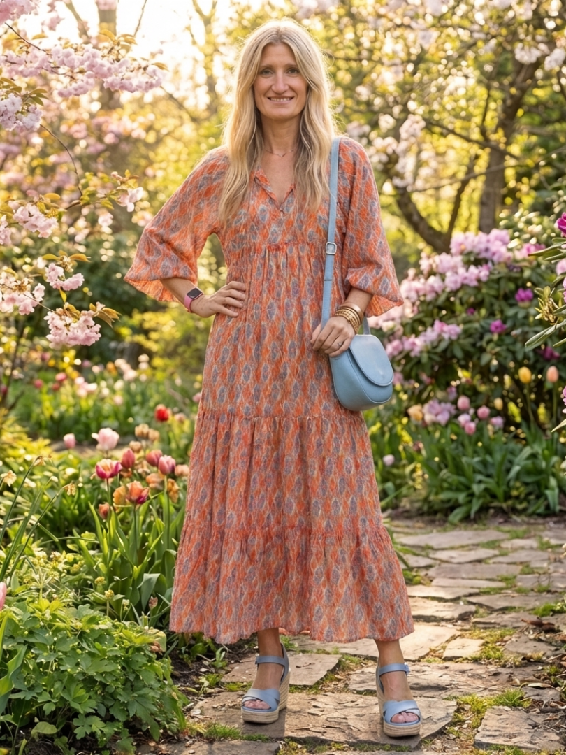 Amara | Vestido midi em camadas com estampa geométrica e decote em V