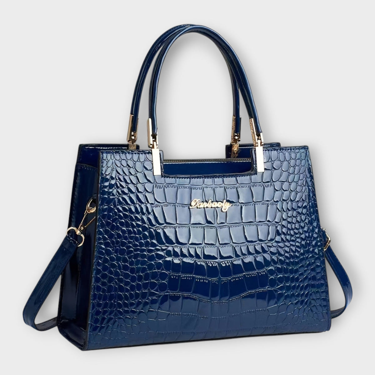 Olivia - Borsa a mano lucida con motivo coccodrillo