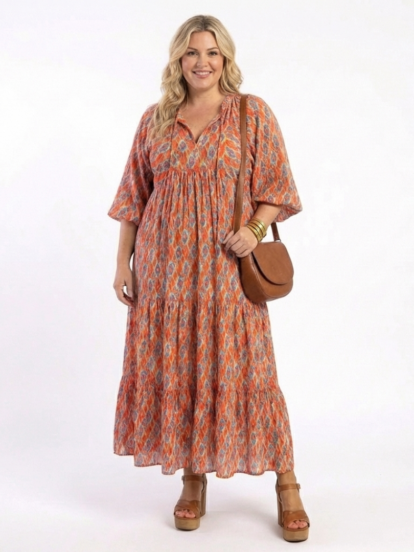 Amara | Vestido midi em camadas com estampa geométrica e decote em V