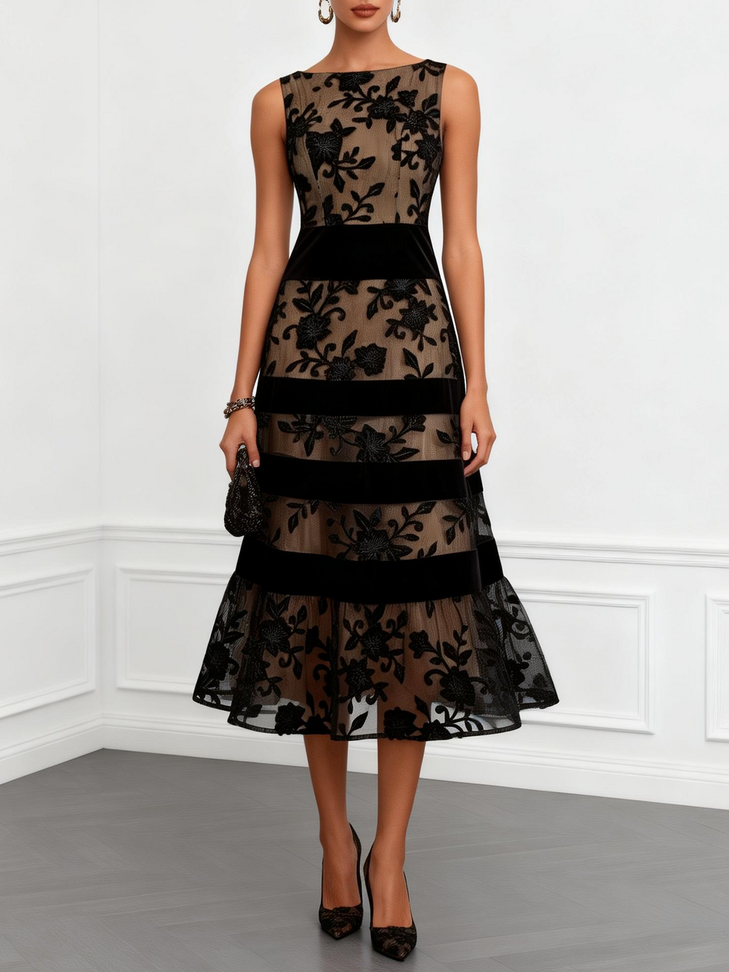 Vestido midi negro de malla transparente con estampado floral, sin mangas y corte evasé