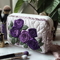 Odie | Trousse de maquillage matelassée Pétales élégants