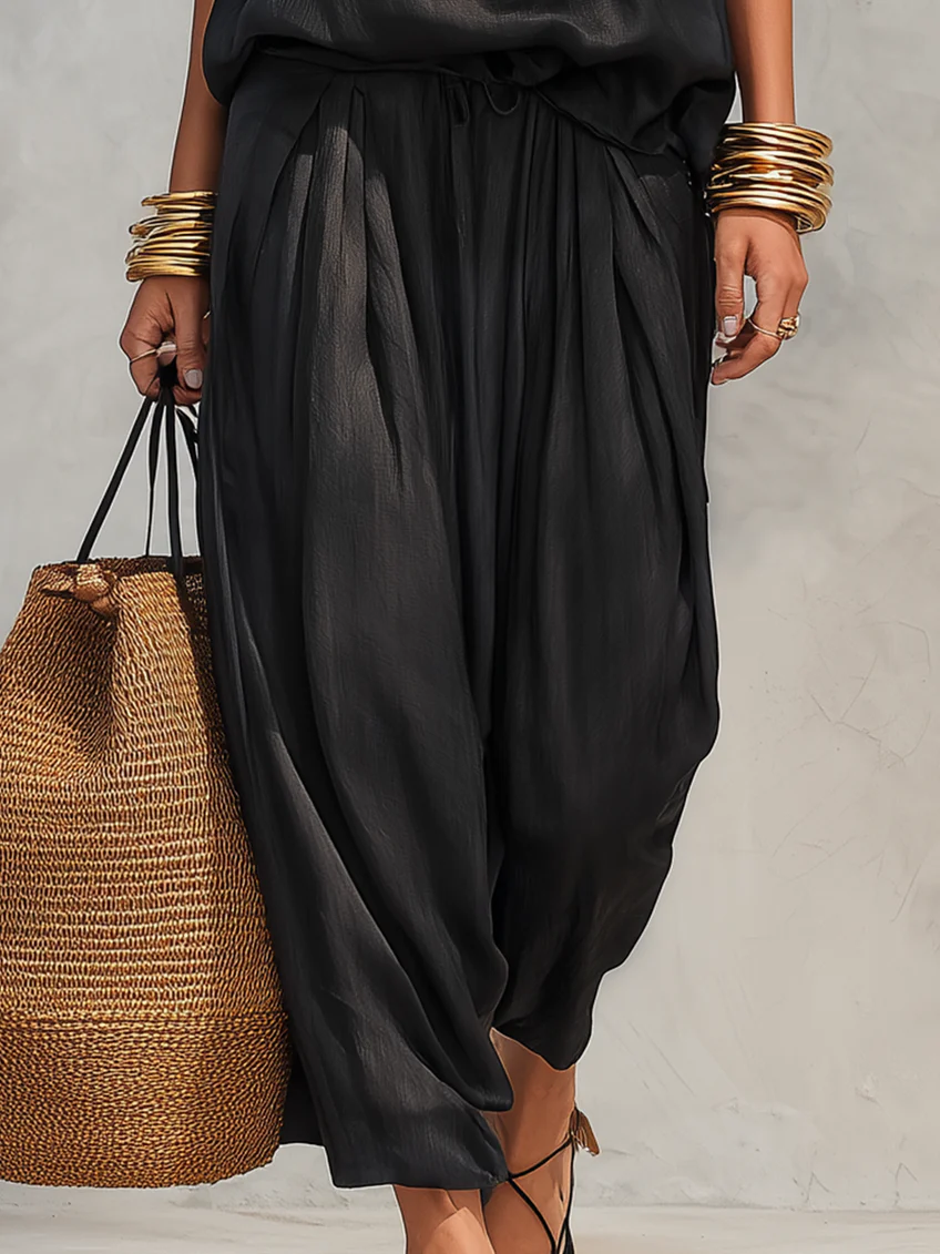 Conjunto de top con cuello halter y pantalones plisados Serena
