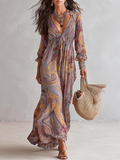 Vestido maxi de chiffon com estampa paisley, decote V e franzido