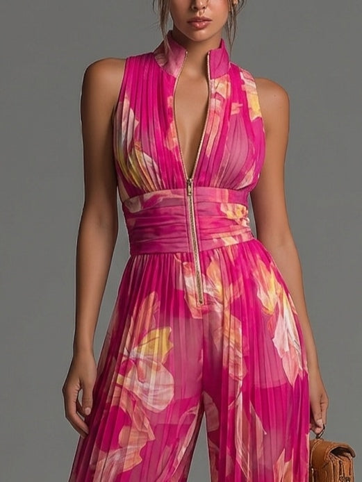 Mono fucsia de gasa con estampado floral, sin mangas, cremallera, plisado y pierna ancha