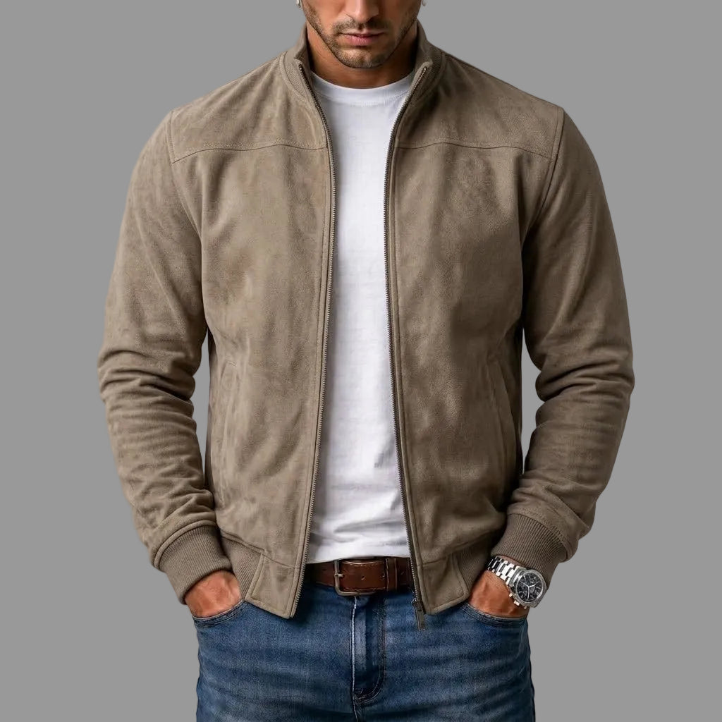 Khaki stand collar zip up jacket with ribbed cuffs, styled with a white tee
