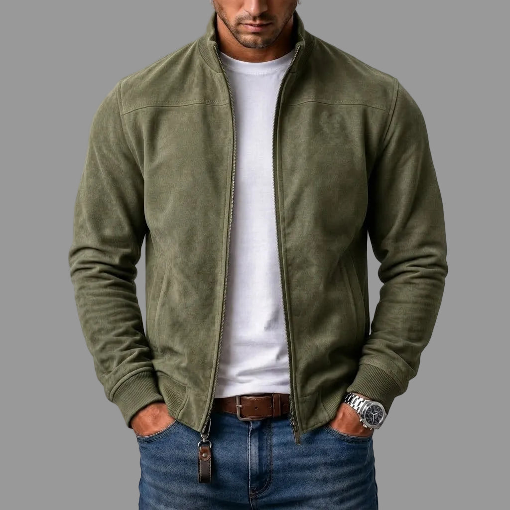 Olive green suede-look zip up jacket on model with hands in jeans pockets