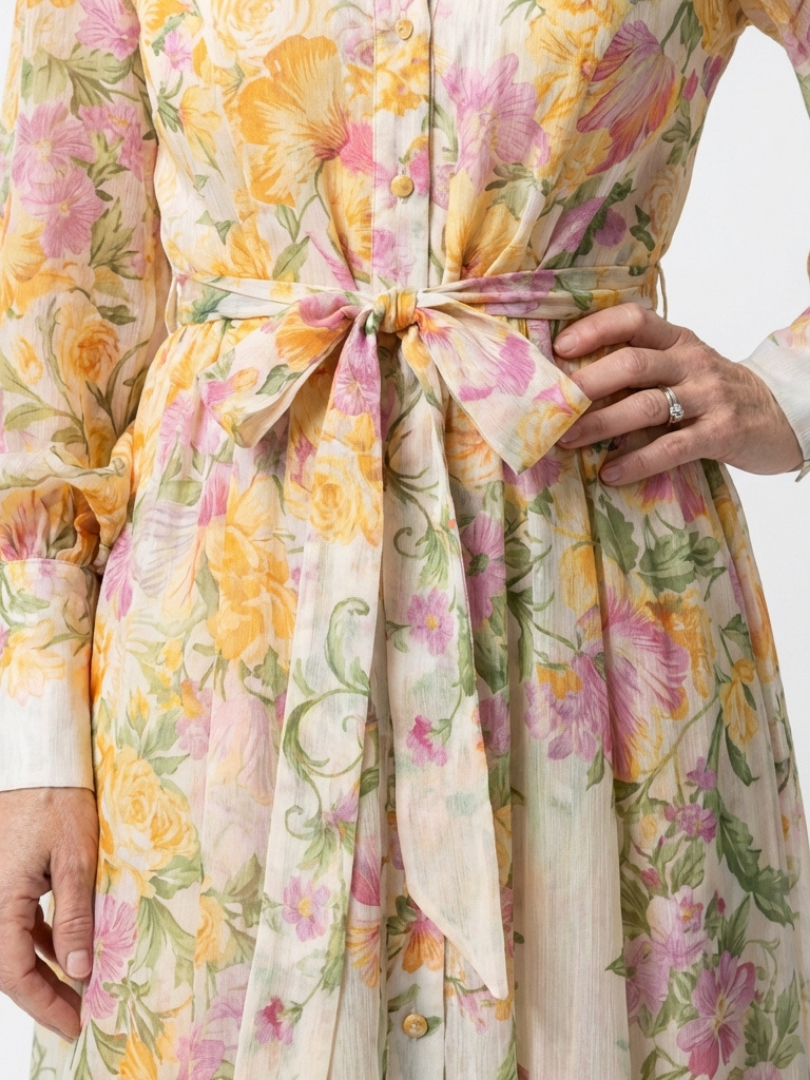 Cressida | Doorschijnende maxi-jurk met lange mouwen en bloemenprint